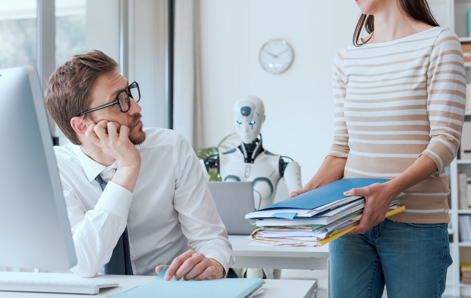 Business people and robot working in the office